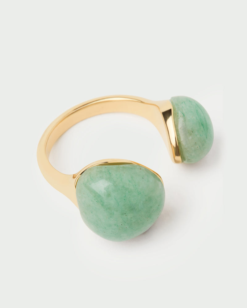 Gold-plated sculptural open ring embellished with two organic green gemstones