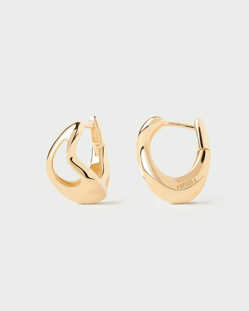 Gold-plated sculptural hoop earrings with an asymmetric drop design