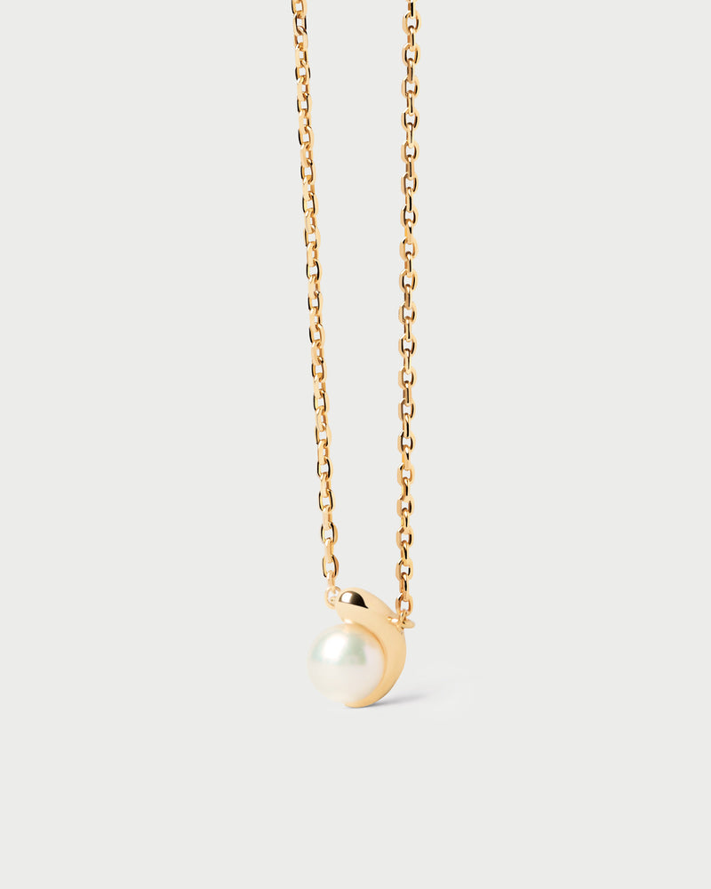 Dainty solitary chain necklace accented with an organic freshwater cultured pearl