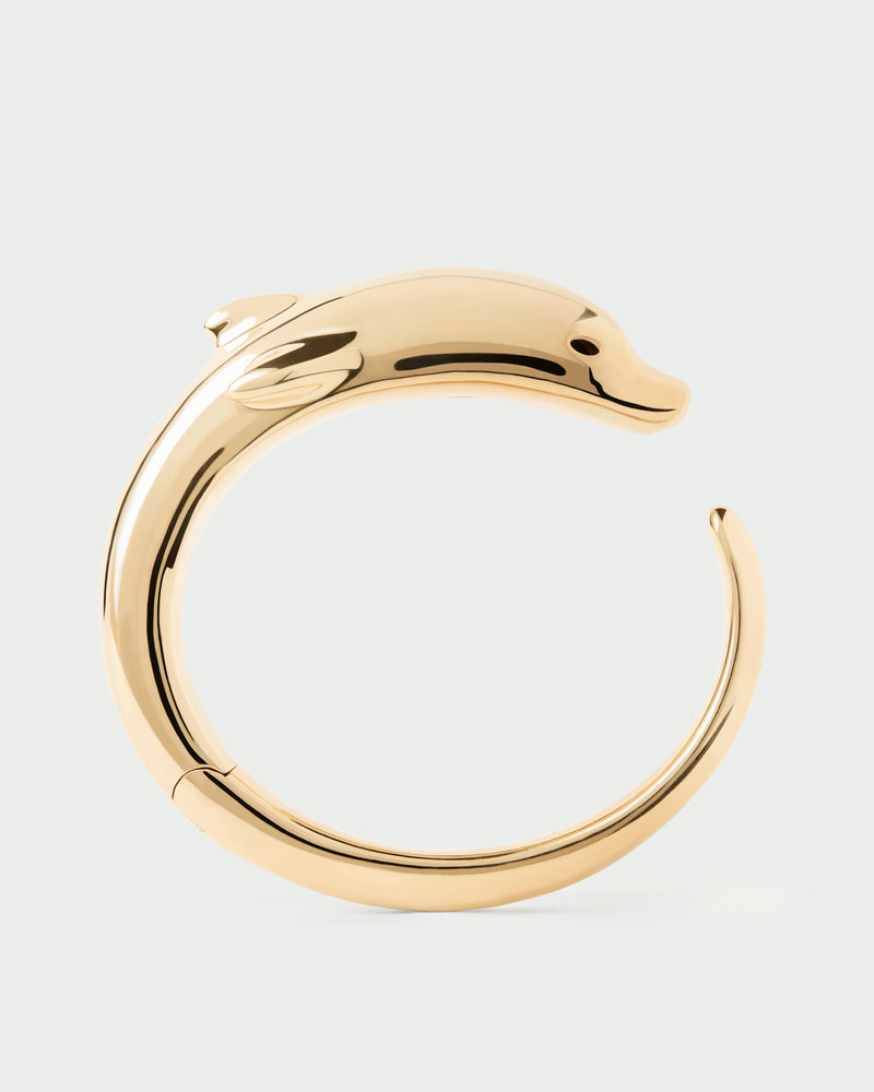 Gold-plated modern dolphin bangle bracelet with a sculptural shape