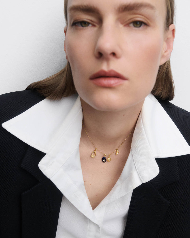 Padlock and key charm - 
  
    Sterling Silver / 18K Gold plating
  
