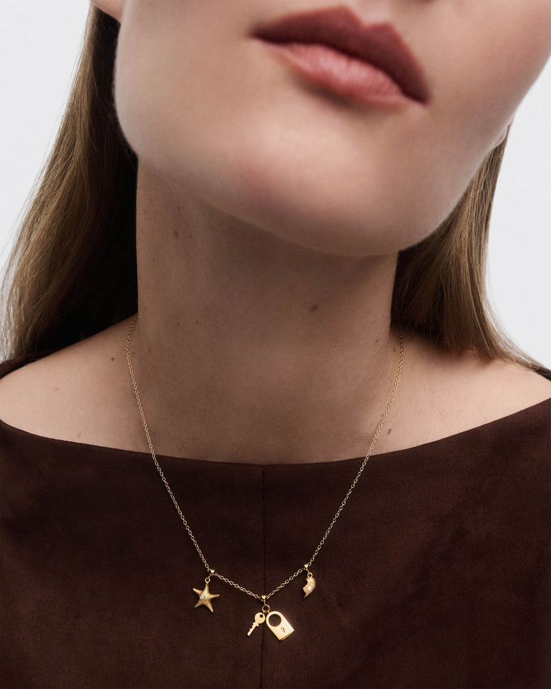 Starfish charm - 
  
    Sterling Silver / 18K Gold plating
  
