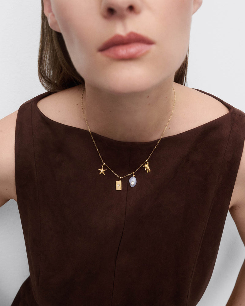 Teddy bear charm - 
  
    Sterling Silver / 18K Gold plating
  
