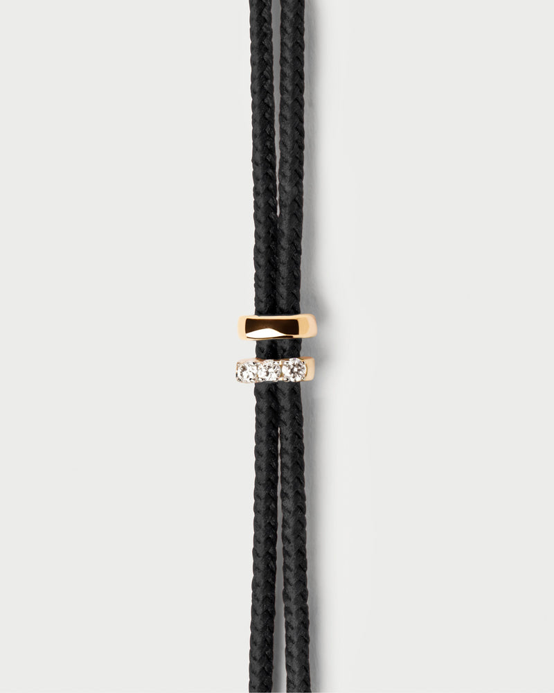 Adjustable diamond cord bracelet featuring two round lab-grown diamond motifs