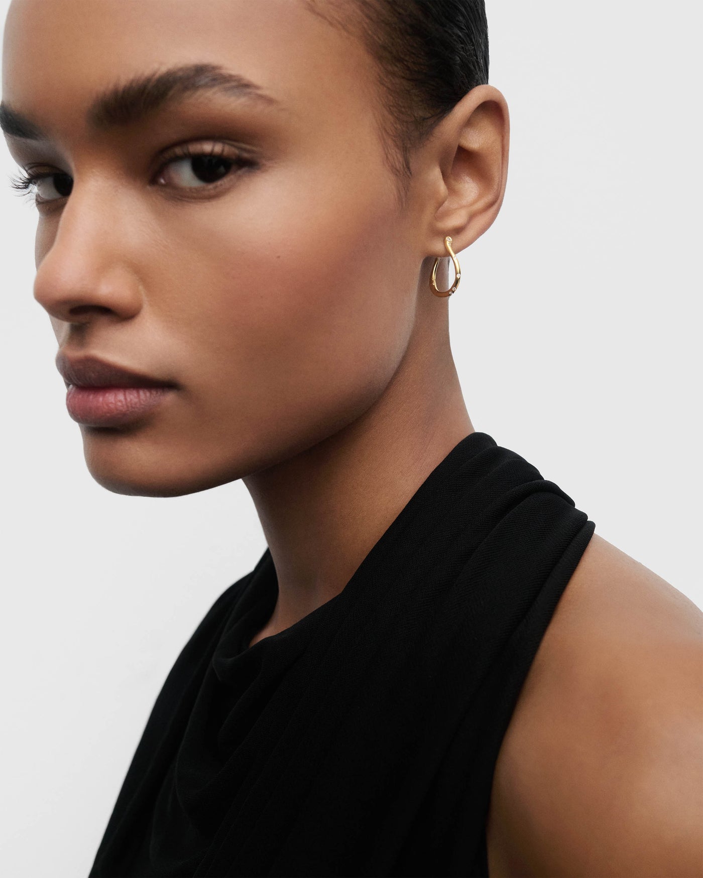 Air mini hoops - 
  
    Sterling Silver / 18K Gold plating
  
