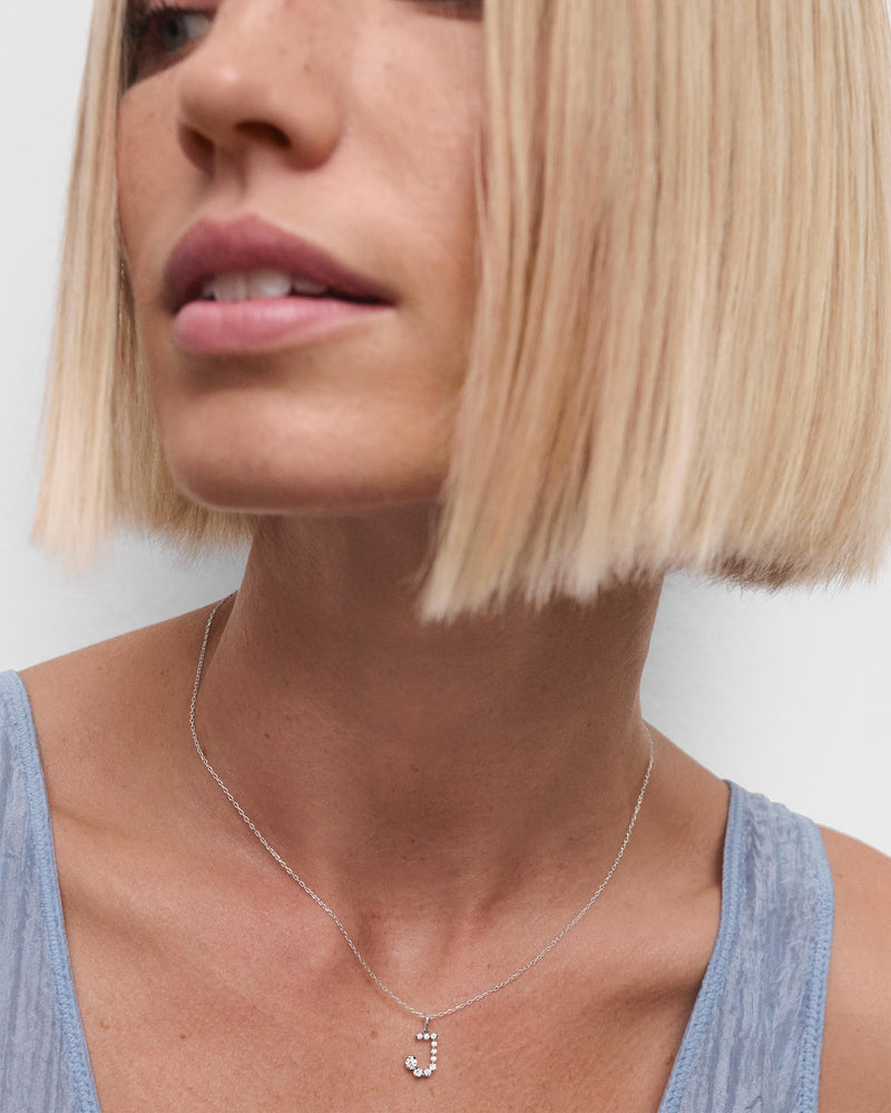 Diamonds and white gold J initial pendant - 
  
    18K White gold / Rhodium silver plating
  
