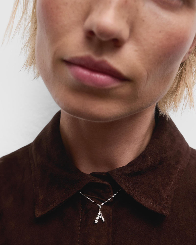 Diamonds and white gold A initial pendant - 
  
    18K White gold / Rhodium silver plating
  
