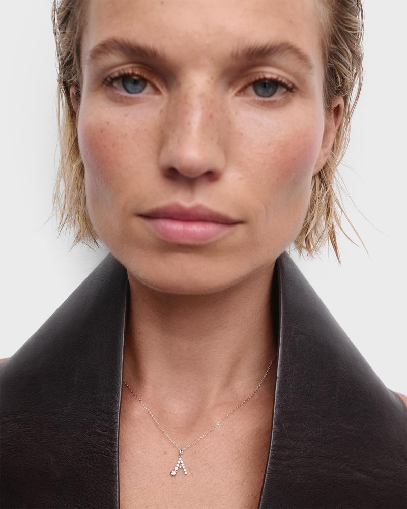 Diamonds and white gold A initial pendant - 
  
    18K White gold / Rhodium silver plating
  
