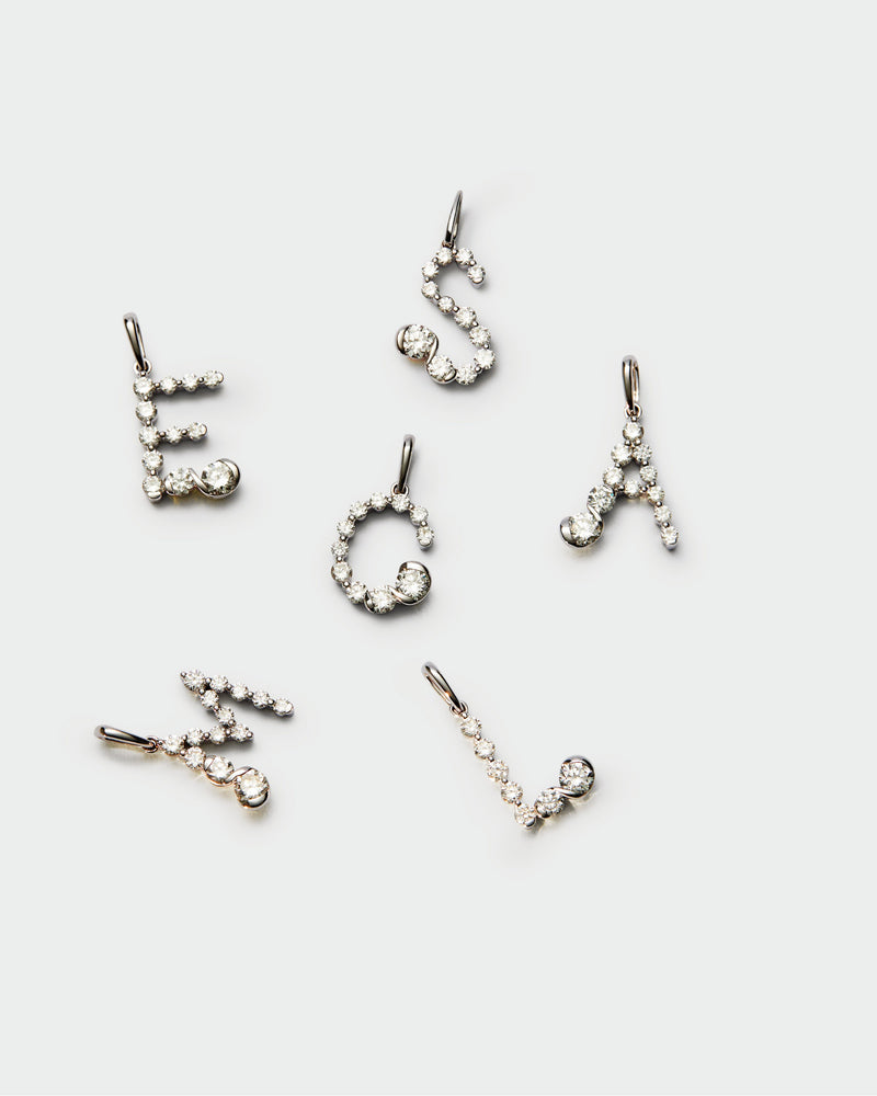 Diamonds and white gold L initial pendant - 
  
    18K White gold / Rhodium silver plating
  

