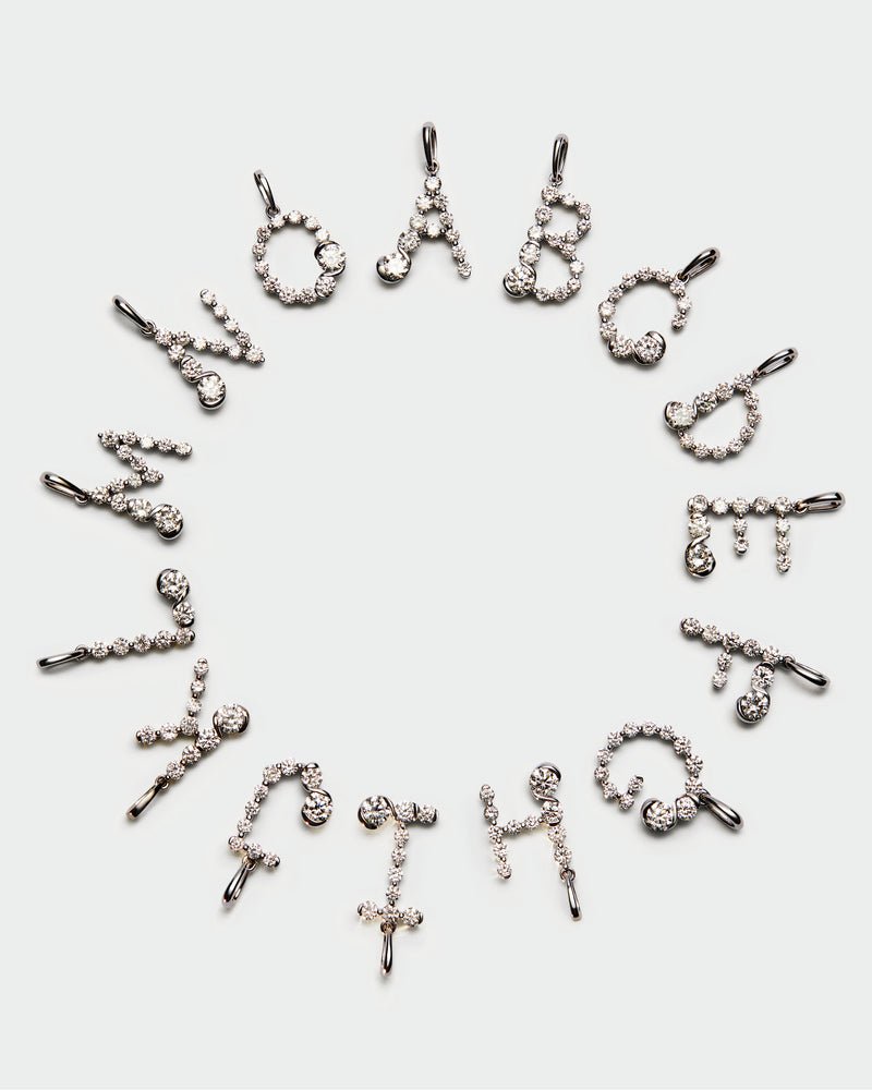 Diamonds and white gold E initial pendant - 
  
    18K White gold / Rhodium silver plating
  
