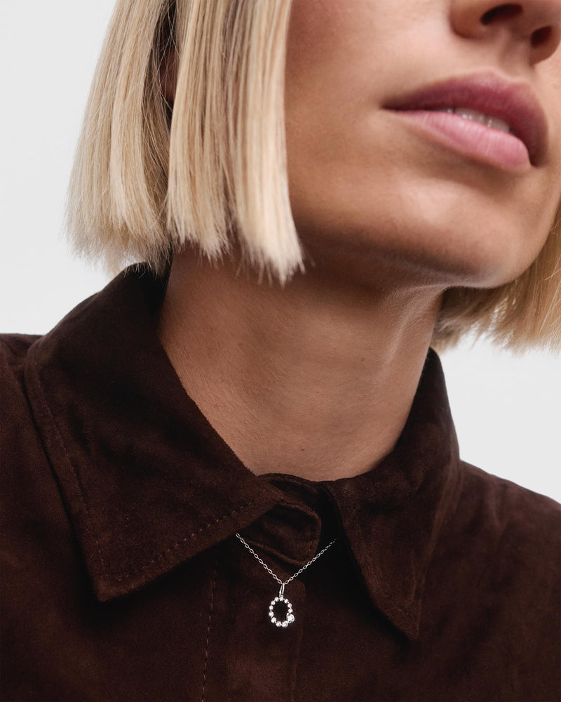 Diamonds and white gold O initial pendant - 
  
    18K White gold / Rhodium silver plating
  
