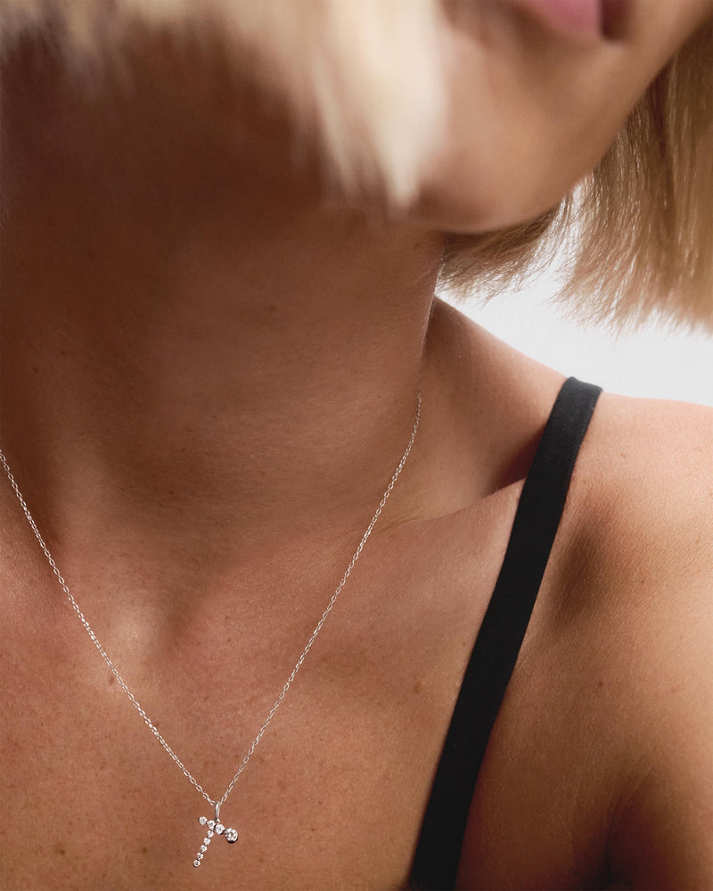 Diamonds and white gold T initial pendant - 
  
    18K White gold / Rhodium silver plating
  
