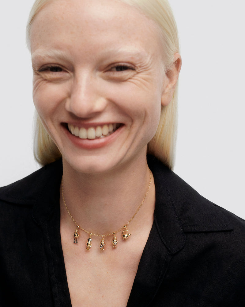 Guitar player Charm - 
  
    Sterling Silver / 18K Gold plating
  
