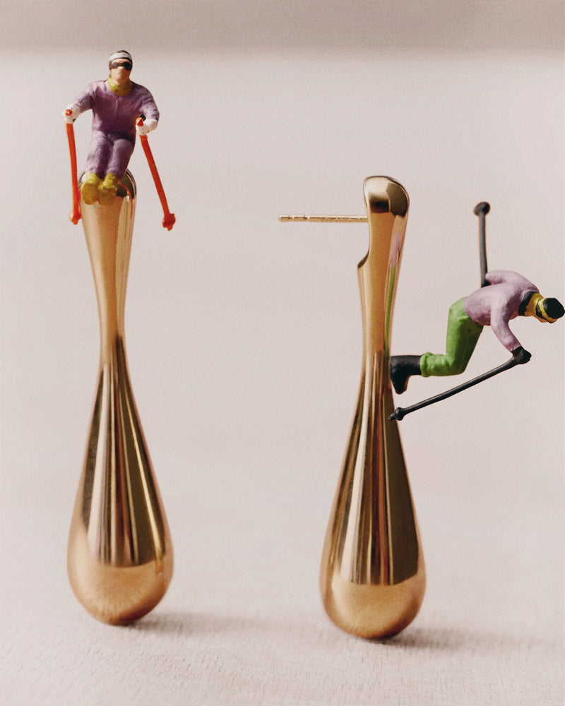 Elegant long drop earrings with sculptural design