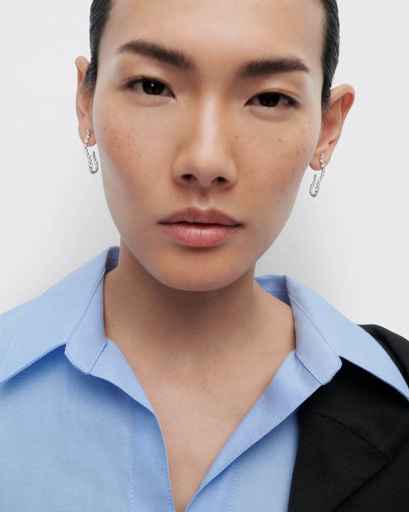 Diamonds and white gold Venus hoops - 
  
    18K White gold / Rhodium silver plating
  
