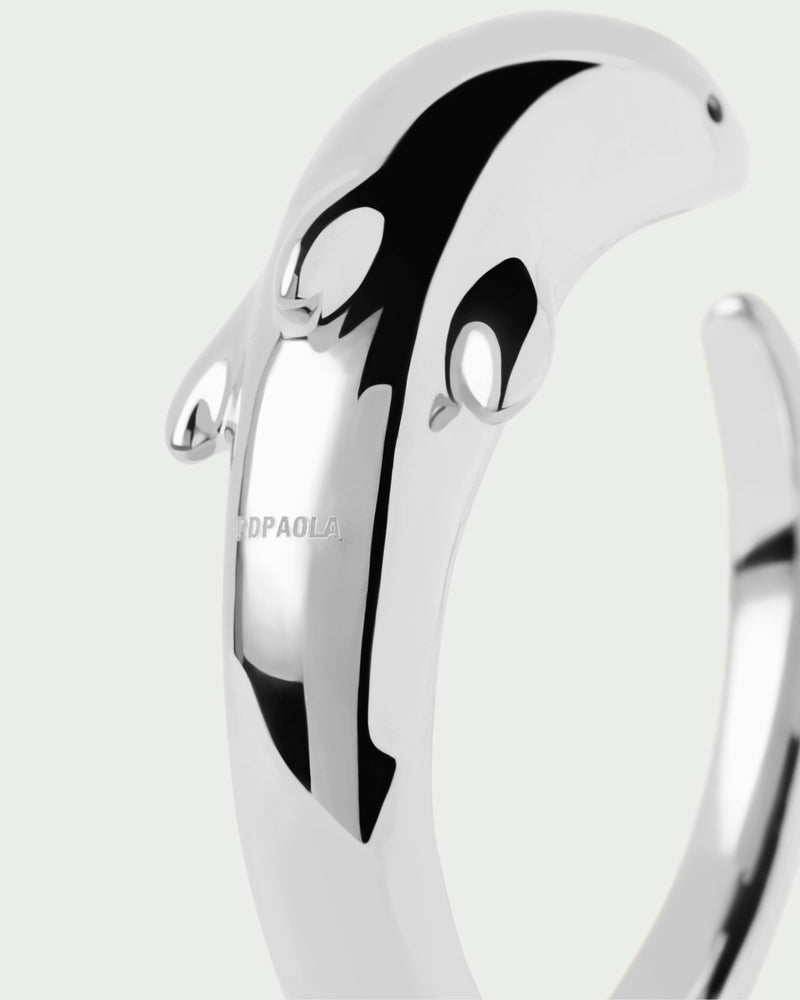 Silver modern dolphin bangle bracelet with a sculptural shape