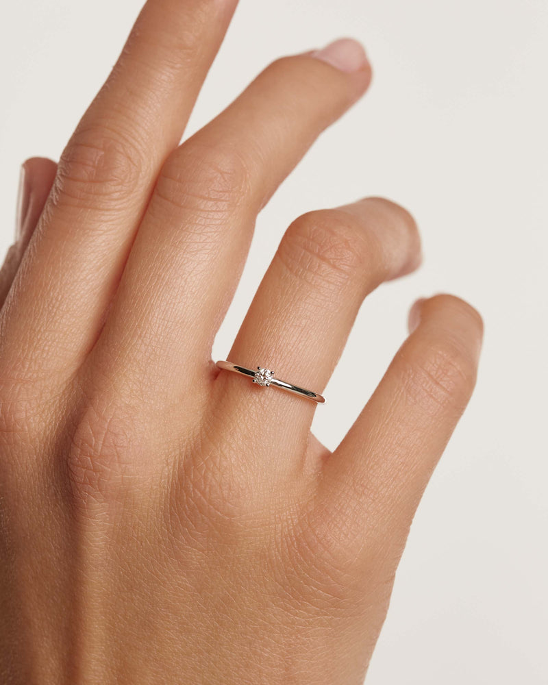Diamonds and White Gold Solitaire Mini Ring - 
  
    18K White gold / Rhodium silver plating
  
