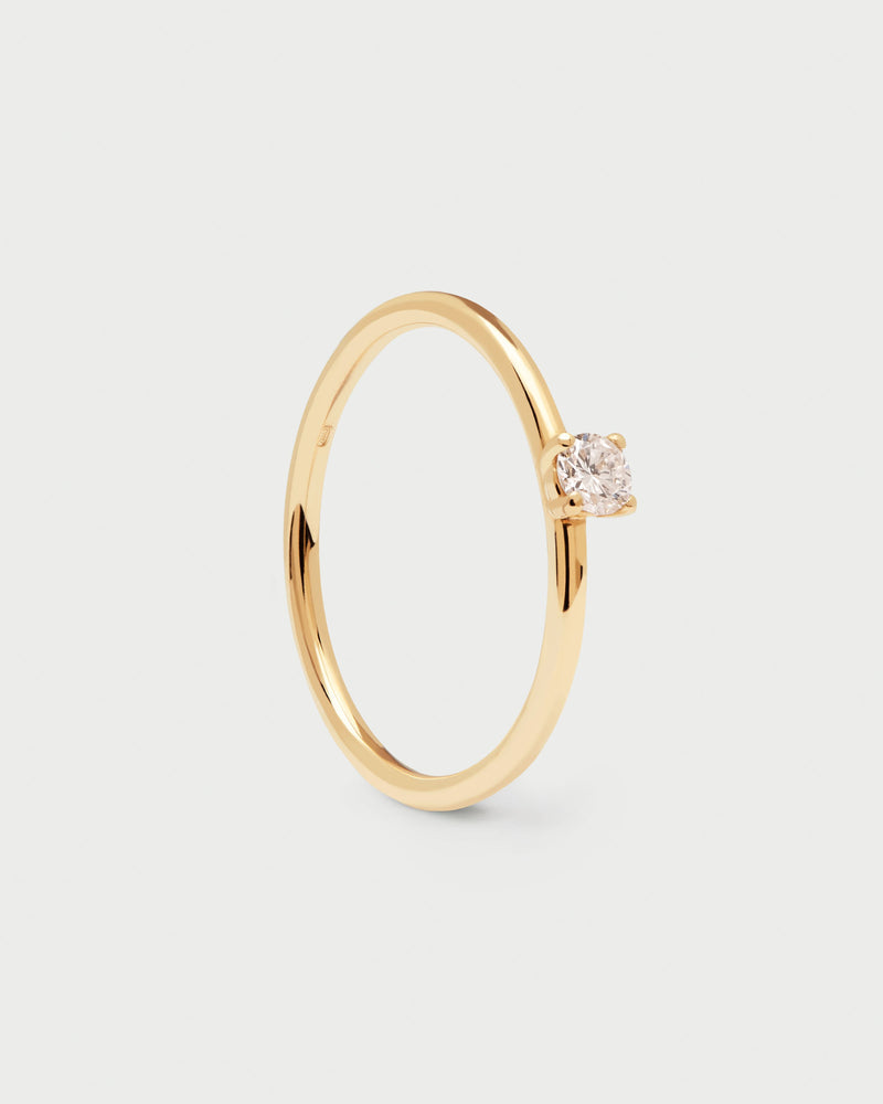 Solid yellow gold engagement ring set with a 0.10 carat solitary lab-grown diamond