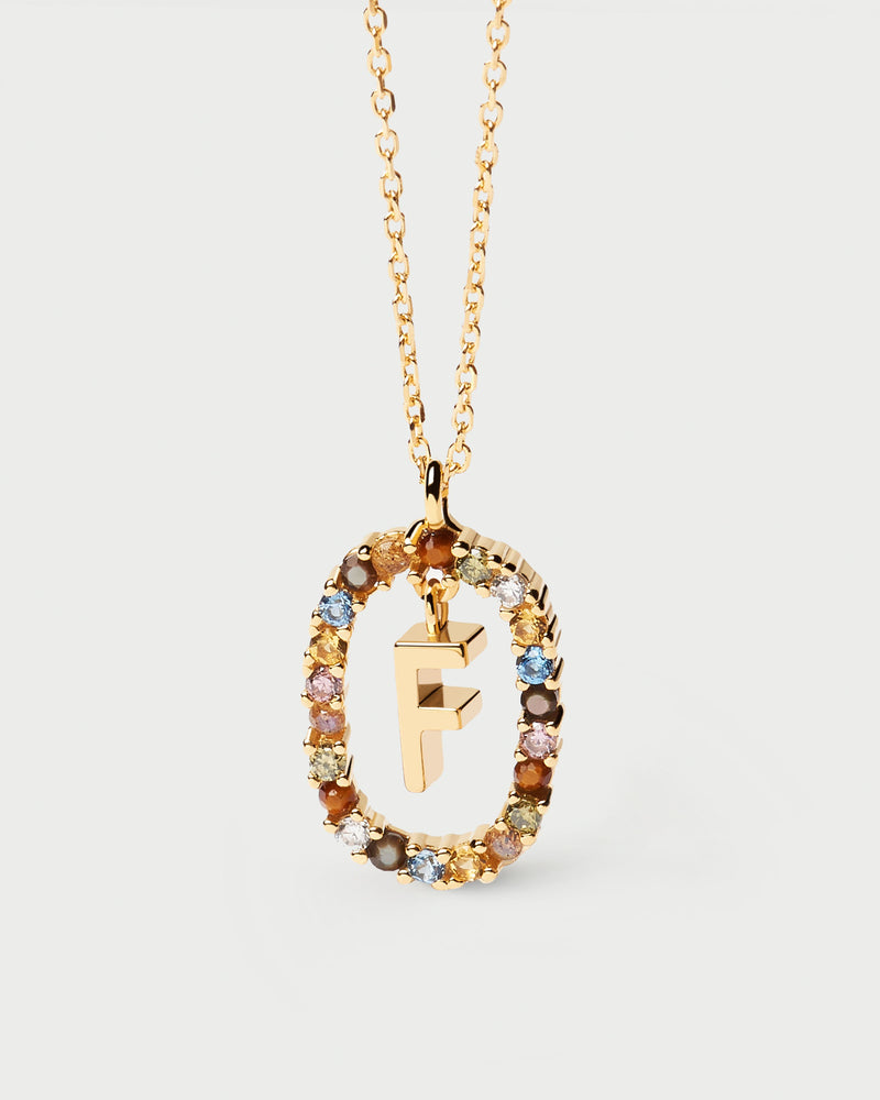 Initial F necklace in gold-plated silver, circled by colorful gemstones