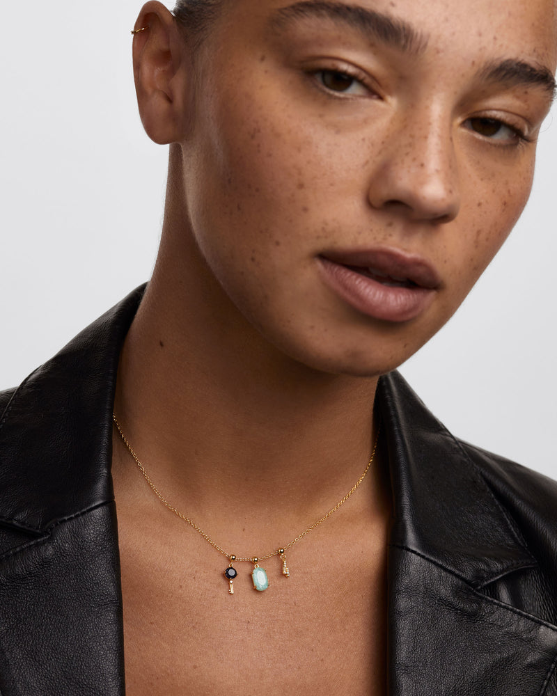 The Key Charm - 
  
    Sterling Silver / 18K Gold plating
  
