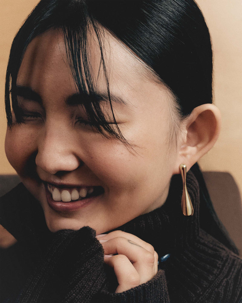 Elegant long drop earrings with sculptural design