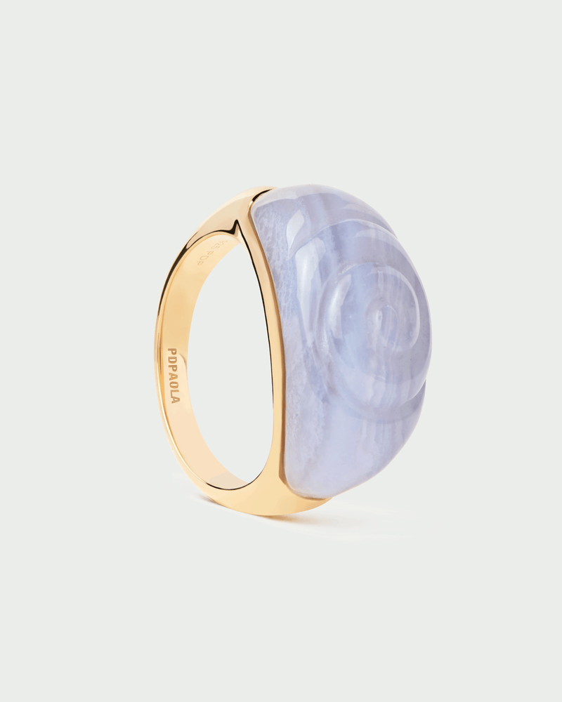 Blue gemstone sea snail ring with a gold-plated band