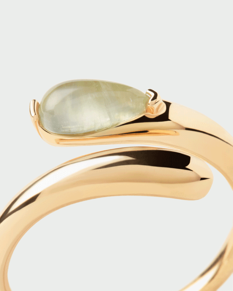 Gold-plated fluid open ring embellished with a green oval gemstone